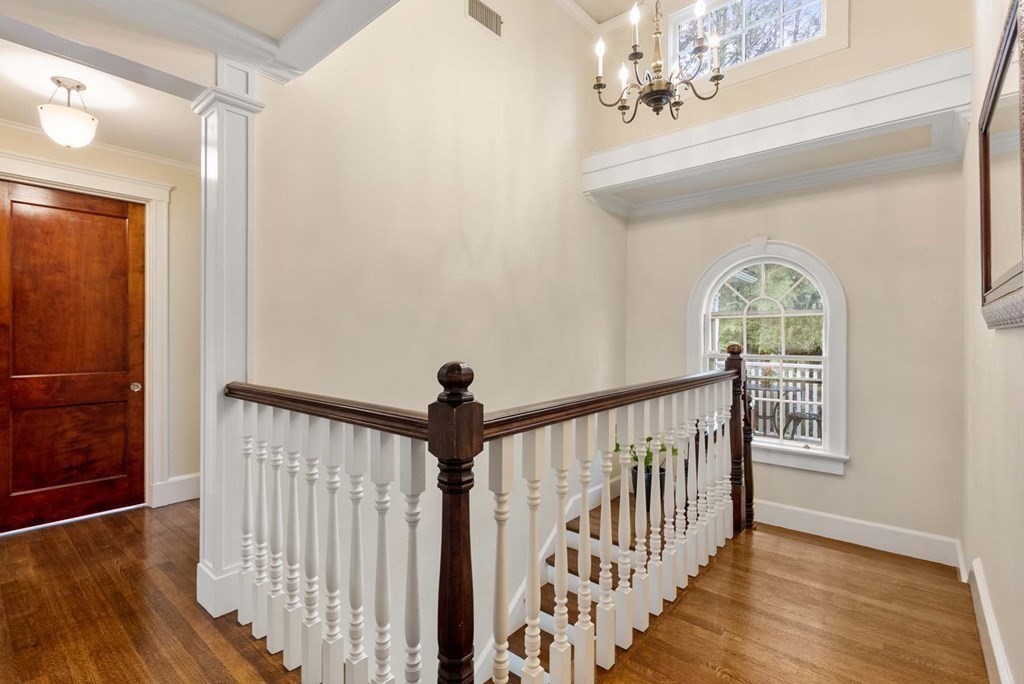 22 Barnstable Road Newton, MA 02465 - Photo 19 of 41 a view of entryway with wooden floor