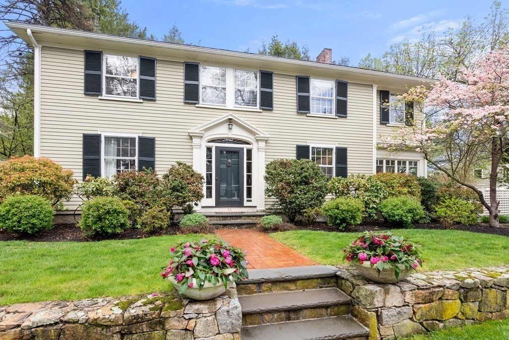 22 Barnstable Road Newton, MA 02465 - Photo 2 of 41 a house with a yard and a garden