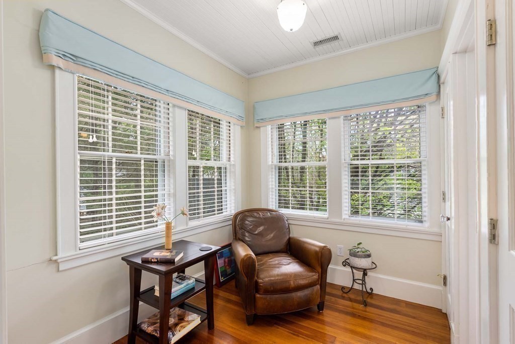 22 Barnstable Road Newton, MA 02465 - Photo 26 of 41 a living room with furniture and a window