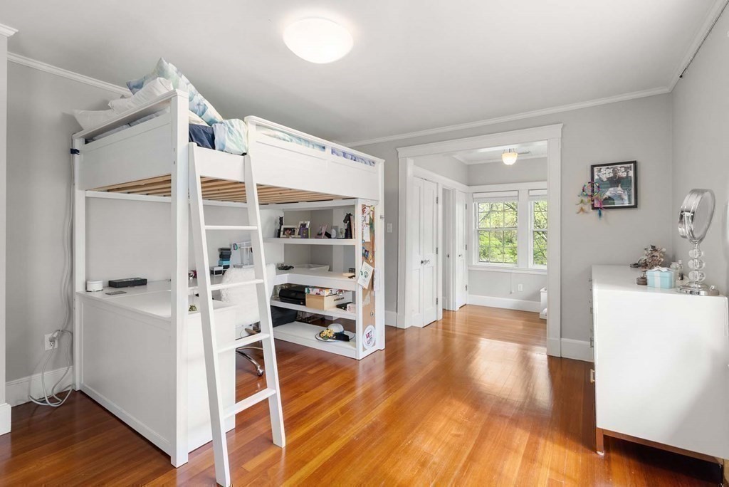 22 Barnstable Road Newton, MA 02465 - Photo 27 of 41 a view of wooden floor and windows in a room