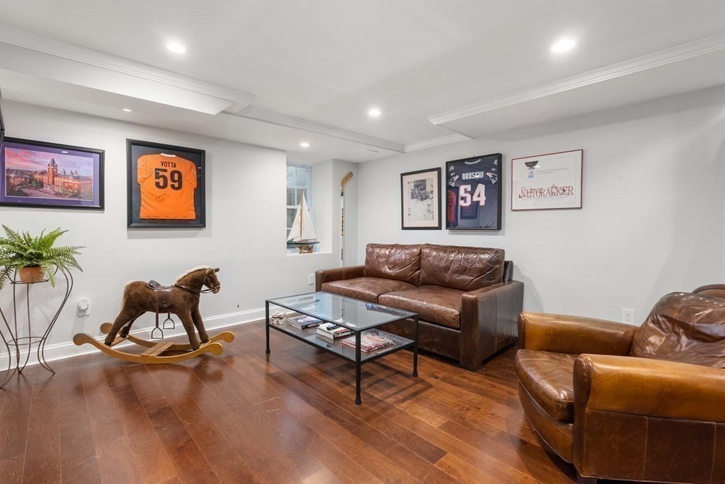 22 Barnstable Road Newton, MA 02465 - Photo 31 of 41 a living room with furniture and a couch