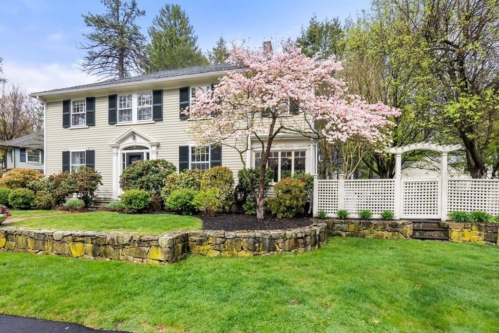 22 Barnstable Road Newton, MA 02465 - Photo 4 of 41 a front view of a house with a yard and tree