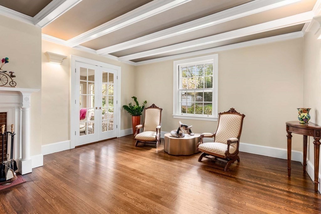 22 Barnstable Road Newton, MA 02465 - Photo 9 of 41 a living room with furniture and a window