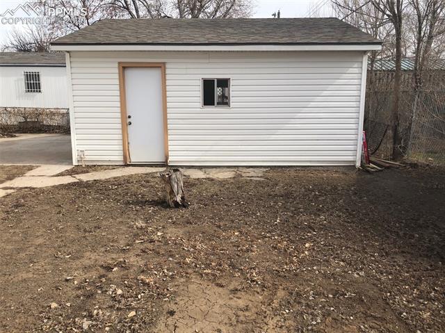 1200 Forest Road Colorado Springs, CO 80906 - Photo 38 of 40 Garage With Service door