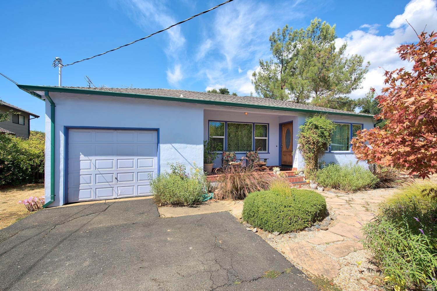 11 Friendly Lane Novato, CA 94945 - Photo 1 of 1 a front view of a house with garden