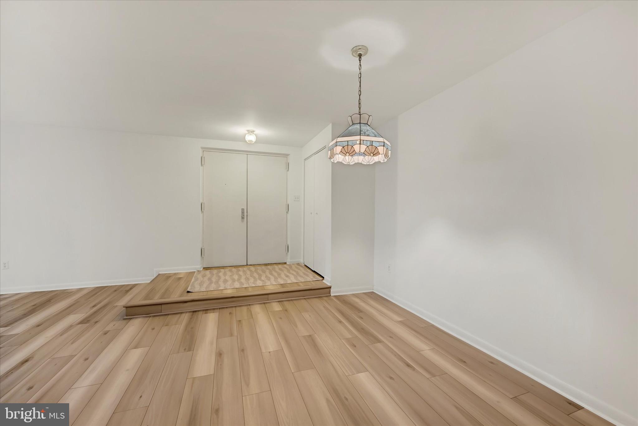 13139 Dairymaid Drive, Unit 99/T1 Germantown, MD 20874 - Photo 3 of 17 a view of empty room with window