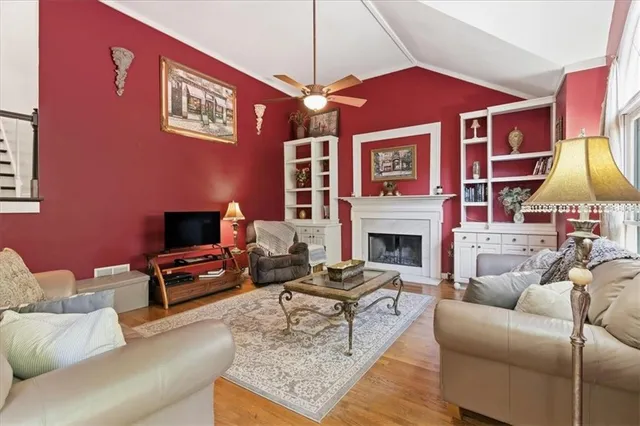 a bedroom with a bed chair and window