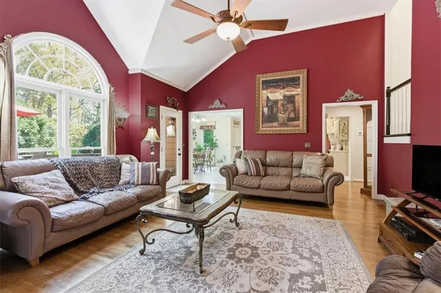 a bathroom with a double vanity sink a mirror and a shower