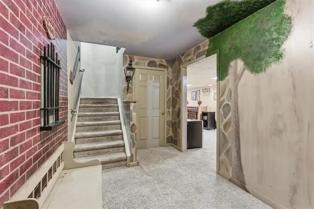 a view of a swimming pool with a yard