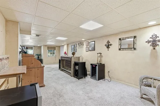 a front view of house with yard and outdoor seating