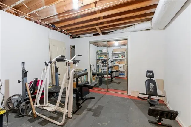 a view of house with yard and green space