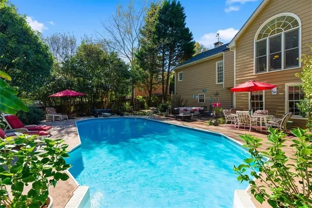 a picture of a bathroom with a shower