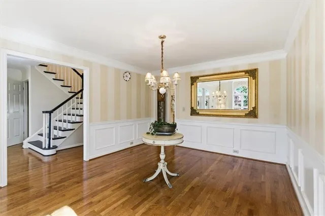 a kitchen with cabinets and stainless steel appliances