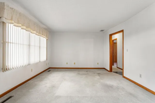 an empty room with a window