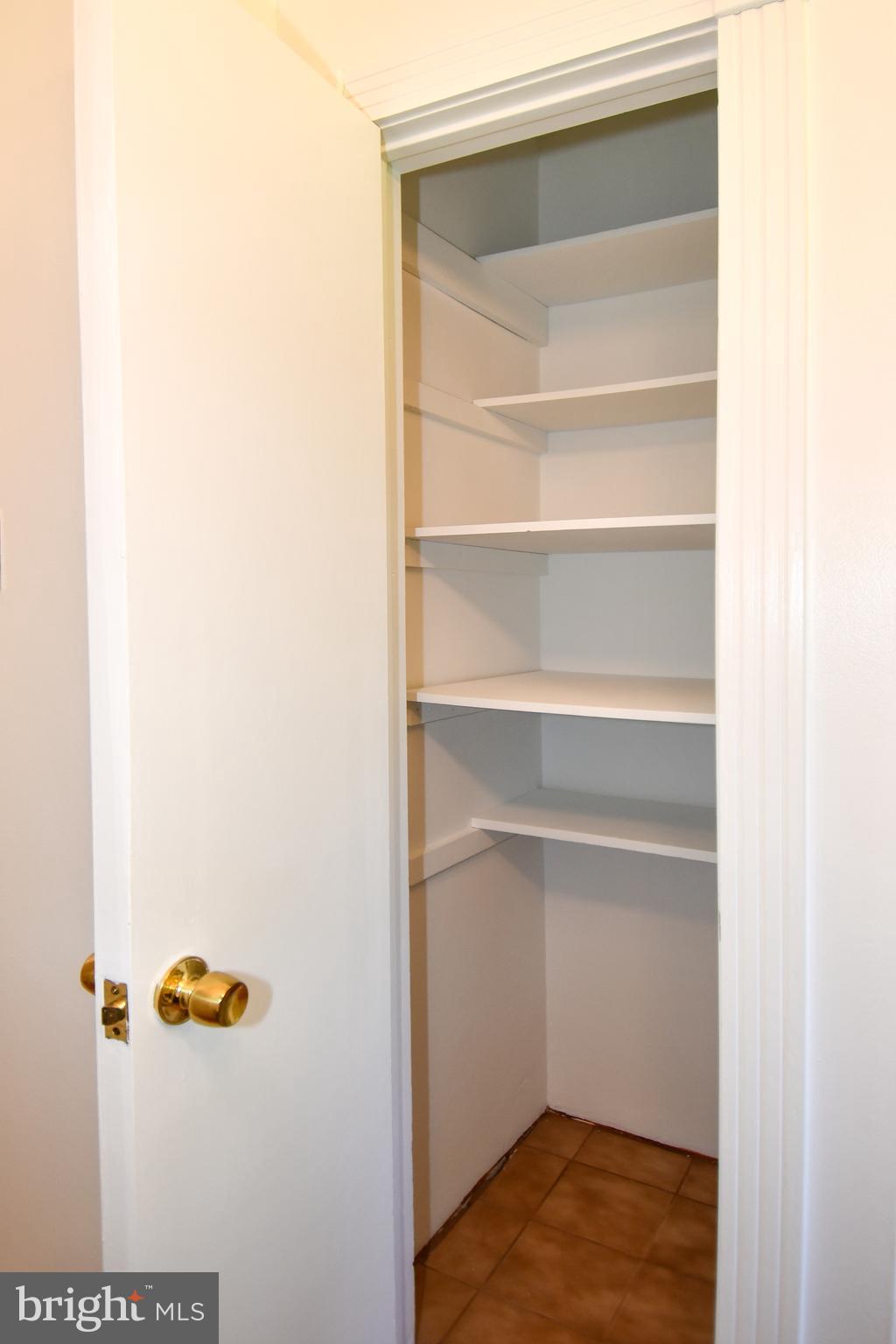 14405 Duckett Road Brandywine, MD 20613 - Photo 23 of 52 HALLWAY BATHROOM LINEN CLOSET