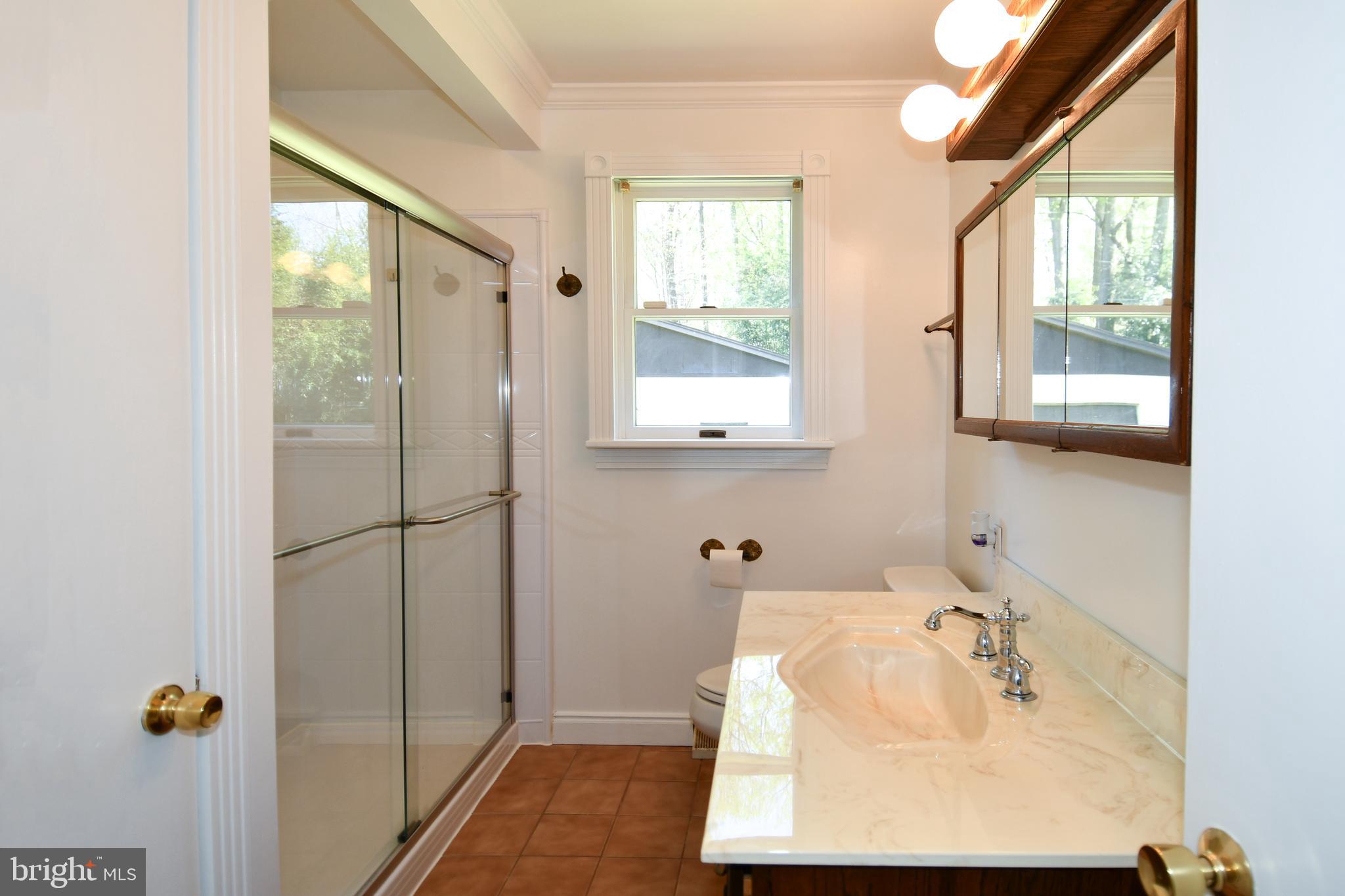 14405 Duckett Road Brandywine, MD 20613 - Photo 24 of 52 HALLWAY BATHROOM WALK-IN SHOWER