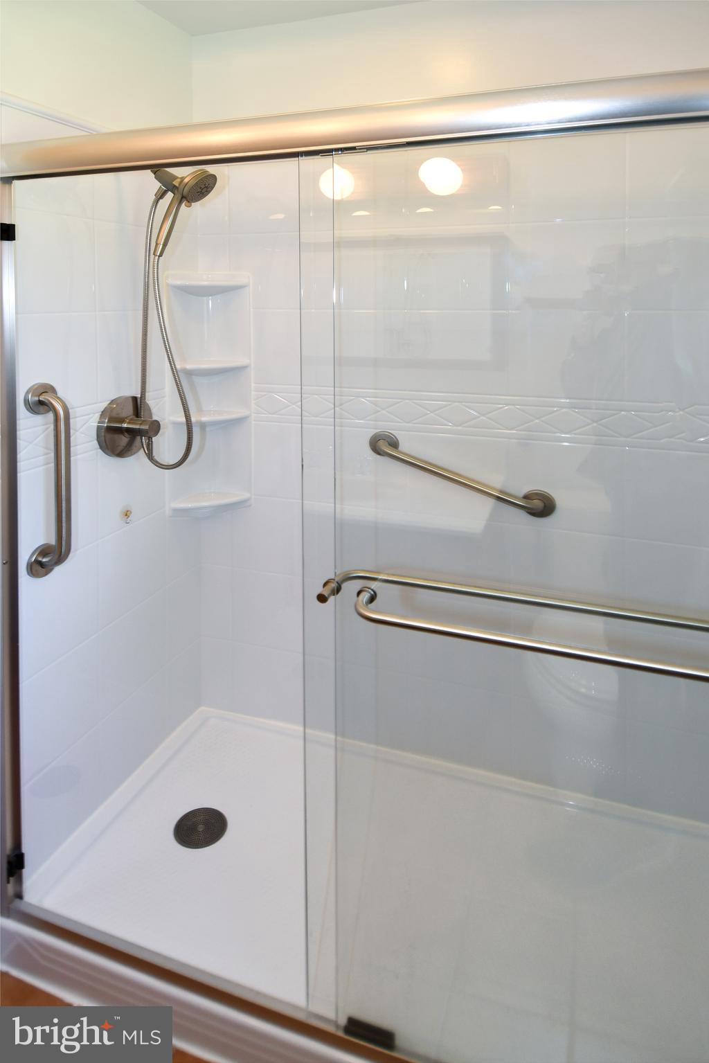 14405 Duckett Road Brandywine, MD 20613 - Photo 25 of 52 HALLWAY BATHROOM SHOWER HAS GRAB BAR