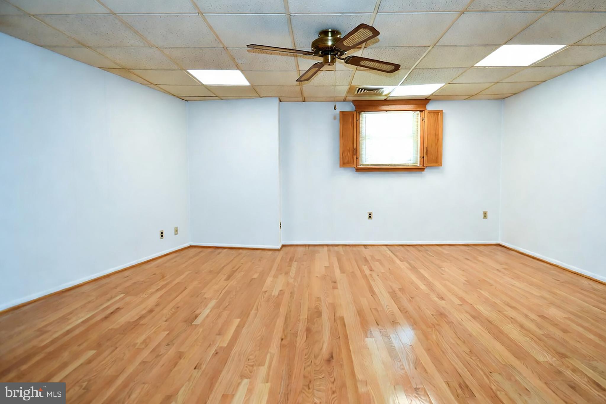 14405 Duckett Road Brandywine, MD 20613 - Photo 34 of 52 FAMILY ROOM HAS GLEAMING WOOD FLOORS