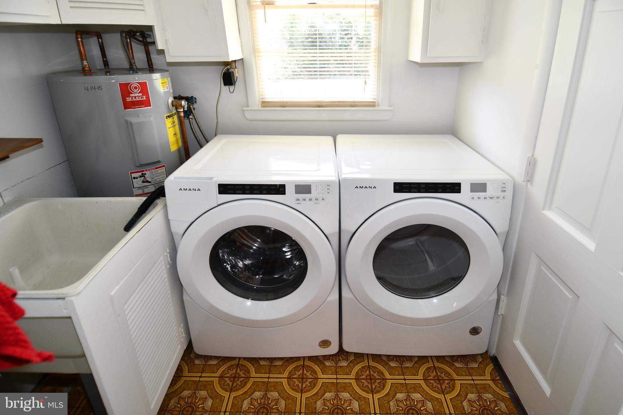 14405 Duckett Road Brandywine, MD 20613 - Photo 38 of 52 LAUNDRY ROOM HAS FRONT LOADER WASHER & DRYER