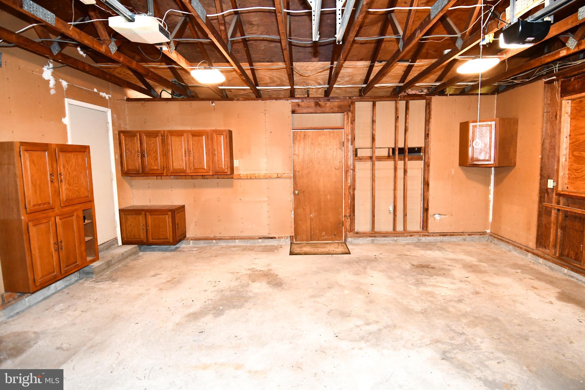14405 Duckett Road Brandywine, MD 20613 - Photo 43 of 52 ATTACHED GARAGE HAS DOOR ACCESS TO STORAGE ROOM