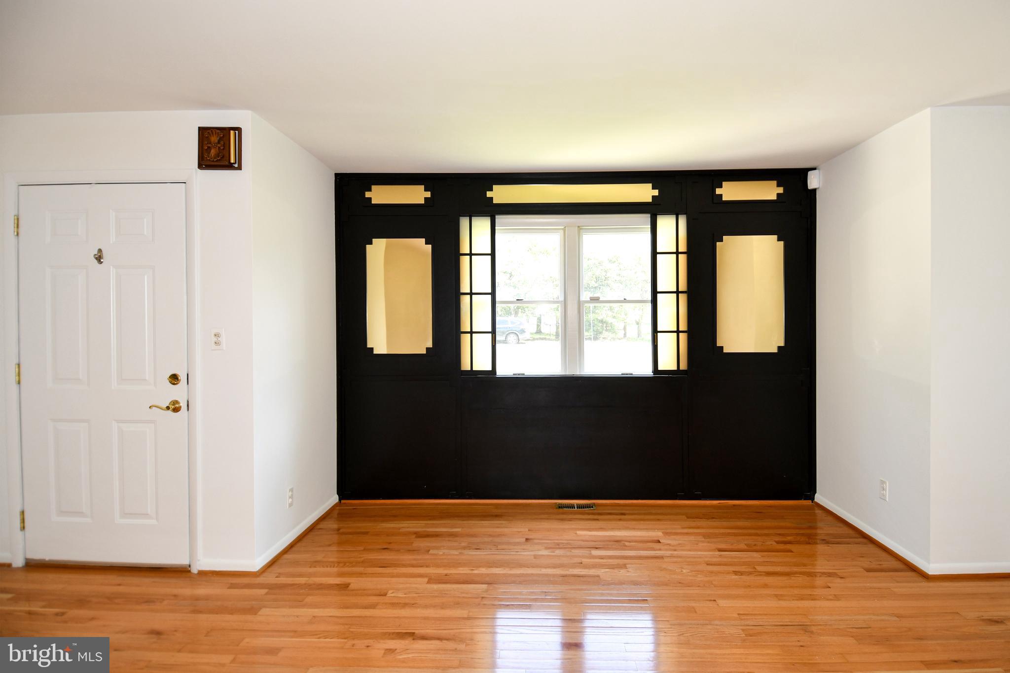 14405 Duckett Road Brandywine, MD 20613 - Photo 5 of 52 LIVING ROOM HAS GLEAMING HARDWOOD FLOORS