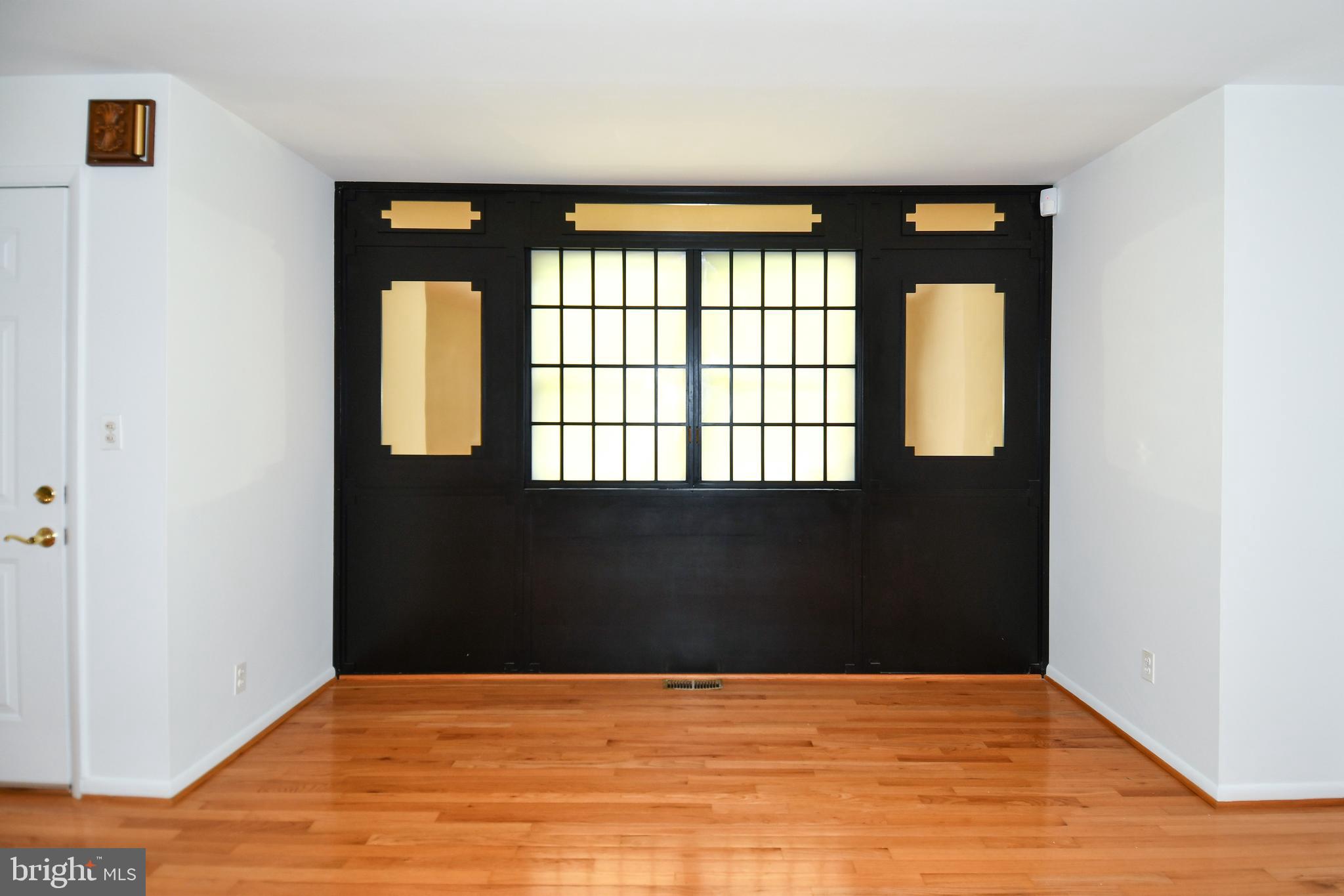 14405 Duckett Road Brandywine, MD 20613 - Photo 6 of 52 LIVING ROOM HAS BUILT-IN SLIDER WINDOW COVERS