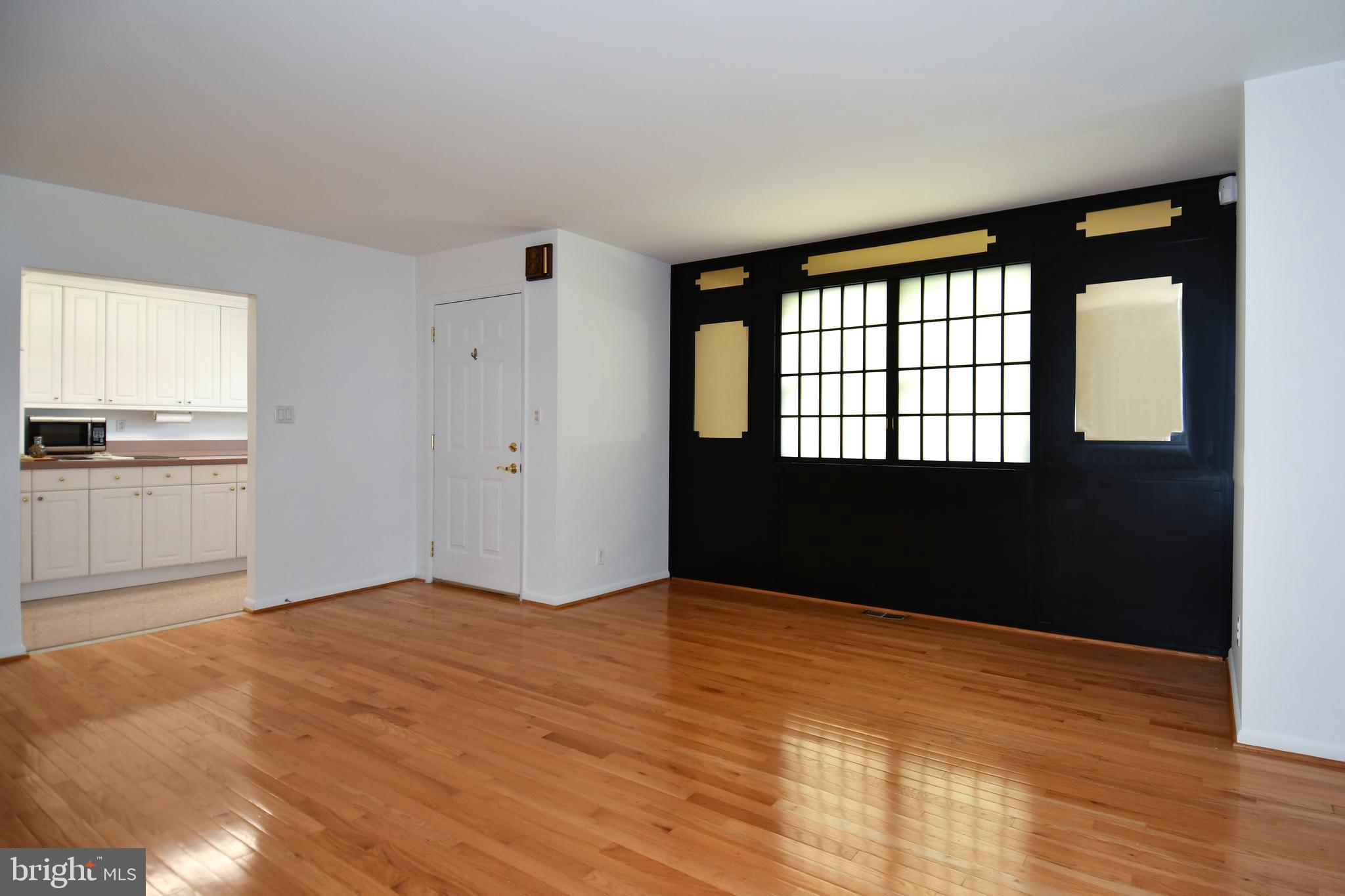 14405 Duckett Road Brandywine, MD 20613 - Photo 8 of 52 LIVING ROOM HAS DOOR ACCESS TO KITCHEN