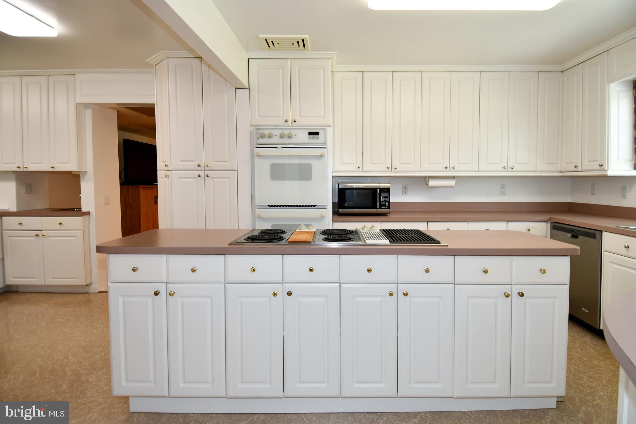 14405 Duckett Road Brandywine, MD 20613 - Photo 10 of 52 HUGE ISLAND W/ LOTS OF CABINETS GREAT FOR STORAGE