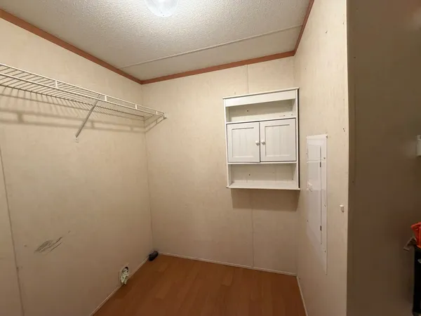 a view of a room with an empty space