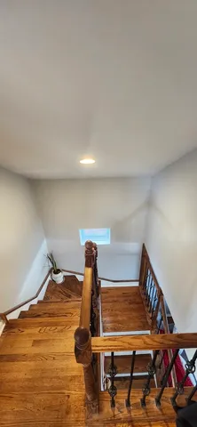a view of entryway with wooden floor
