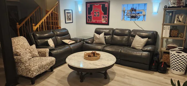a view of a livingroom with furniture and storage