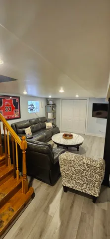 a living room with furniture and a table