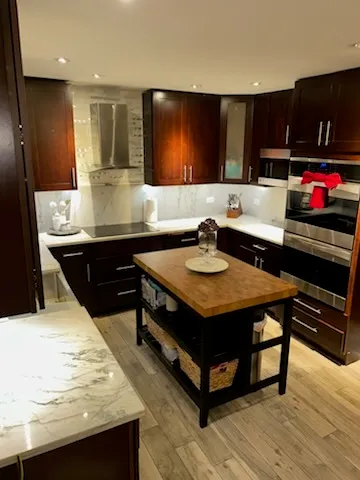 a kitchen with a sink and cabinets