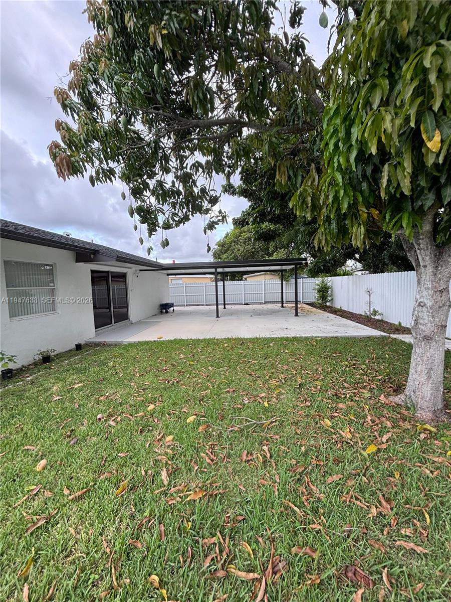 11105 Southwest 156th Terrace Miami, FL 33157 - Photo 7 of 23 a view of house with yard