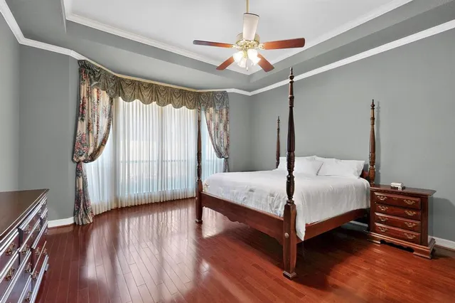 a spacious bathroom with a double vanity sink and a mirror