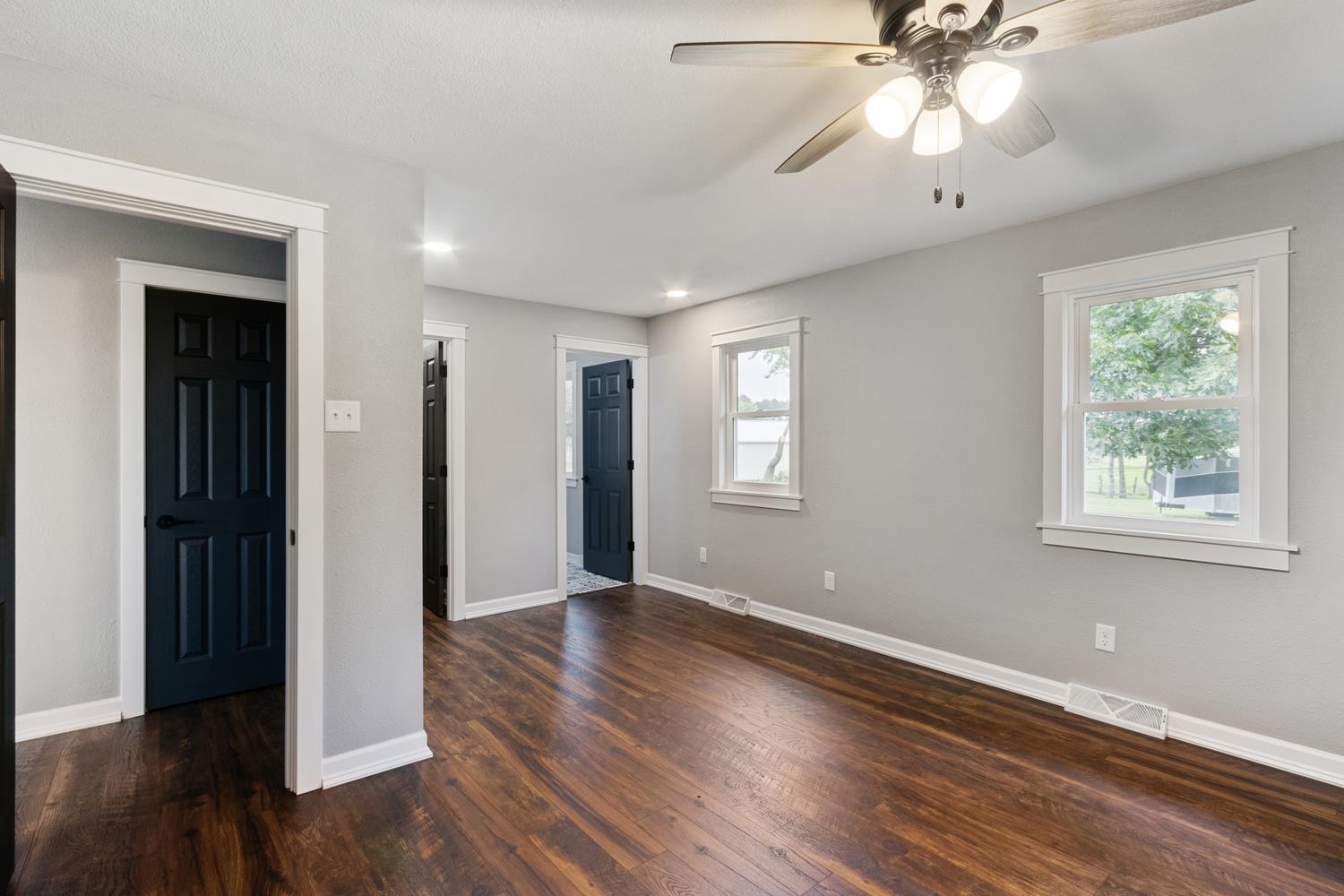 2072 Highway 26 Dixon, IL 61021 - Photo 18 of 30 a view of an empty room with wooden floor and a window