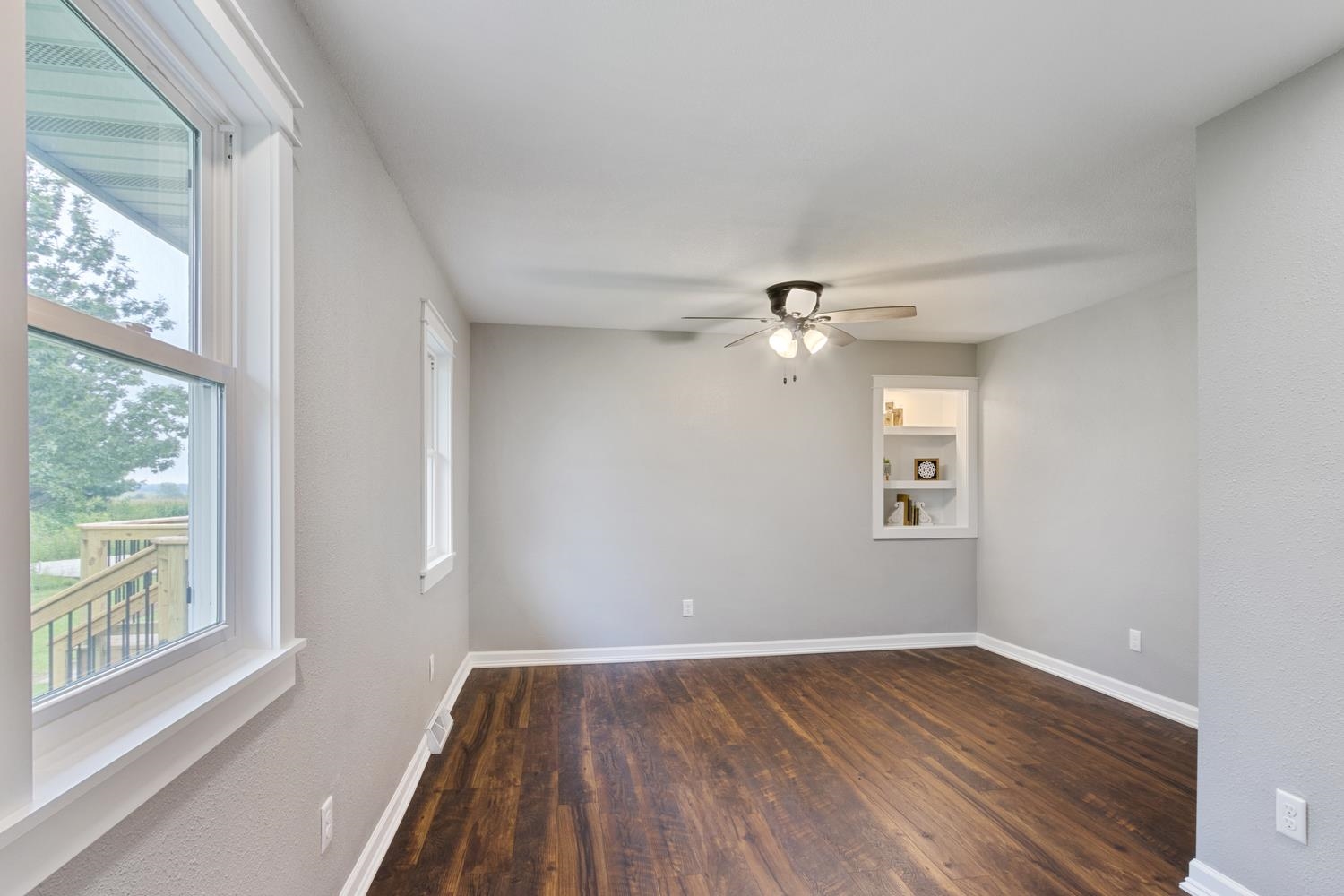 2072 Highway 26 Dixon, IL 61021 - Photo 19 of 30 a view of empty room with wooden floor and fan