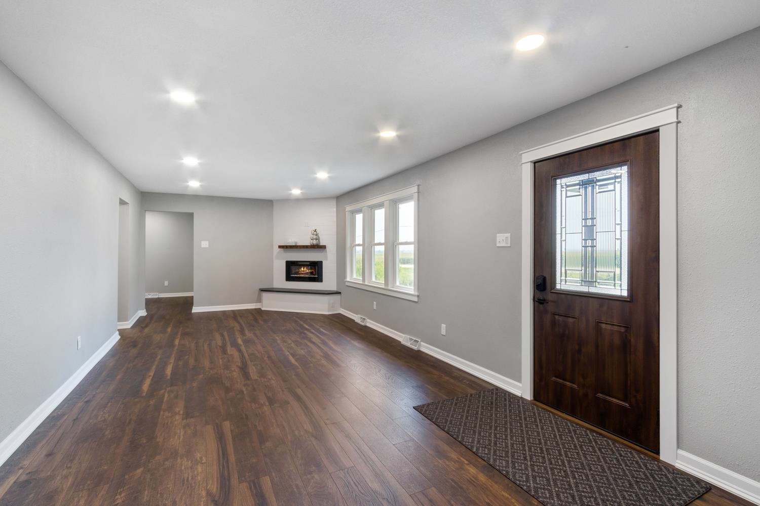 2072 Highway 26 Dixon, IL 61021 - Photo 7 of 30 a view of empty room with wooden floor and fan
