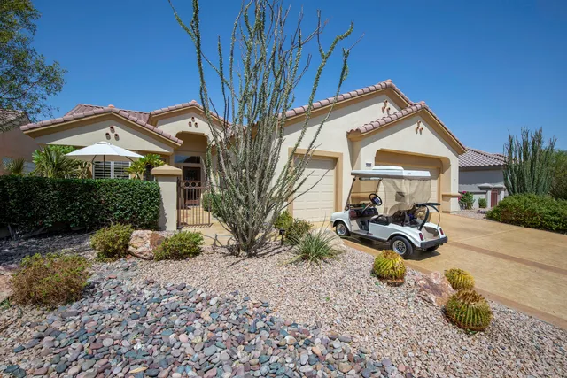 a front view of a house with patio