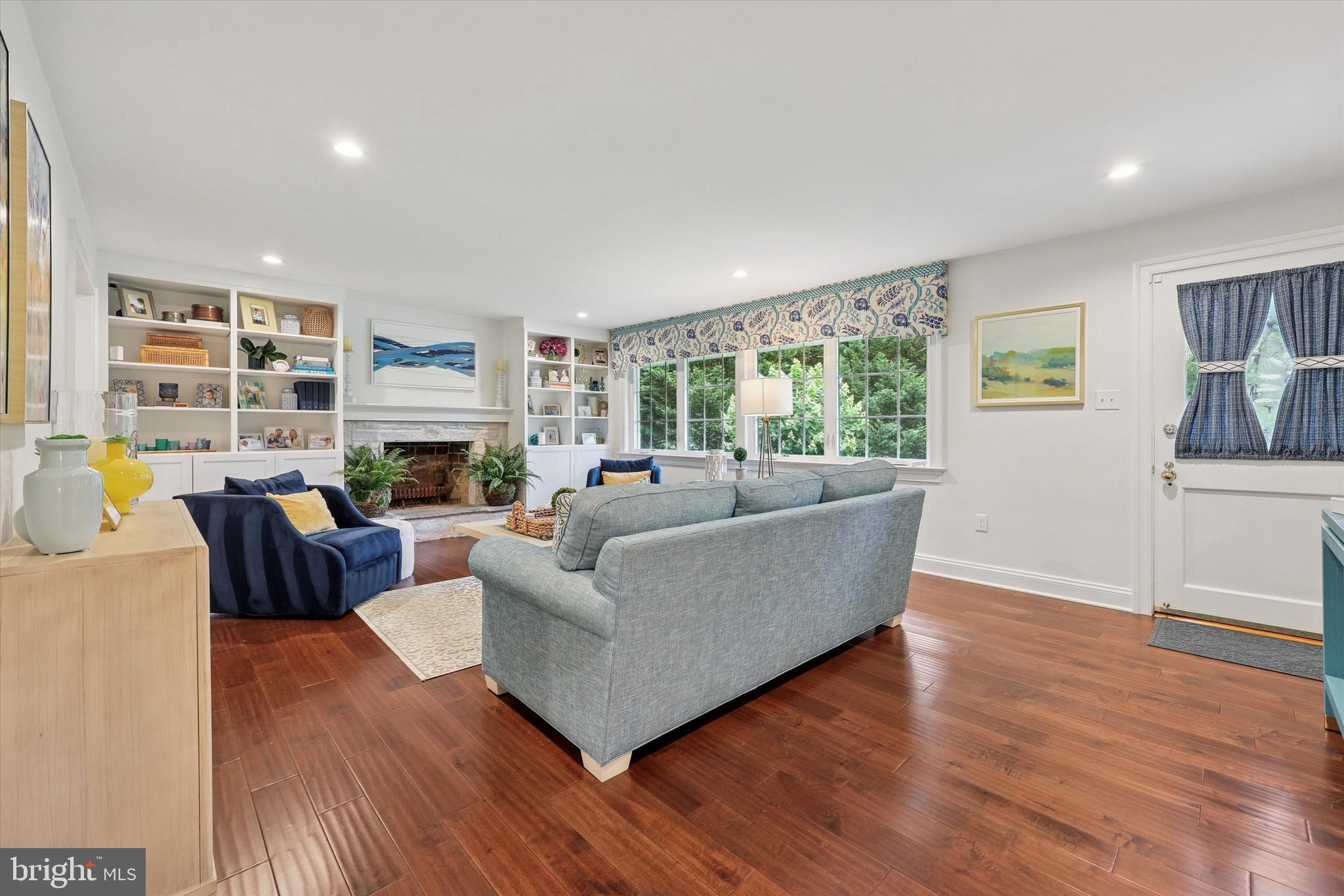 280 Deepdale Road Wayne, PA 19087 - Photo 12 of 35 a living room with furniture fireplace and a window