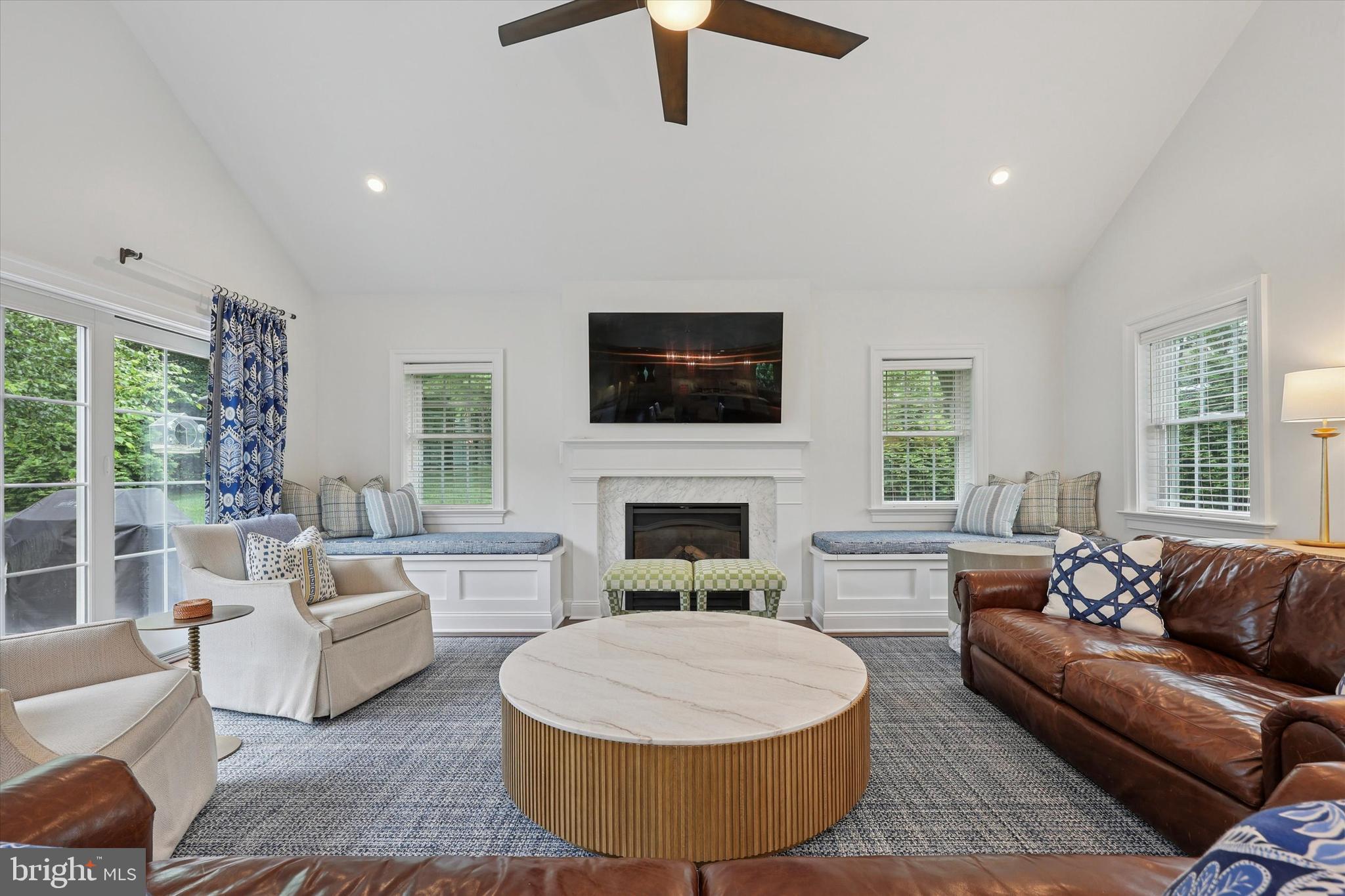 280 Deepdale Road Wayne, PA 19087 - Photo 2 of 35 a living room with furniture a fireplace and a flat screen tv