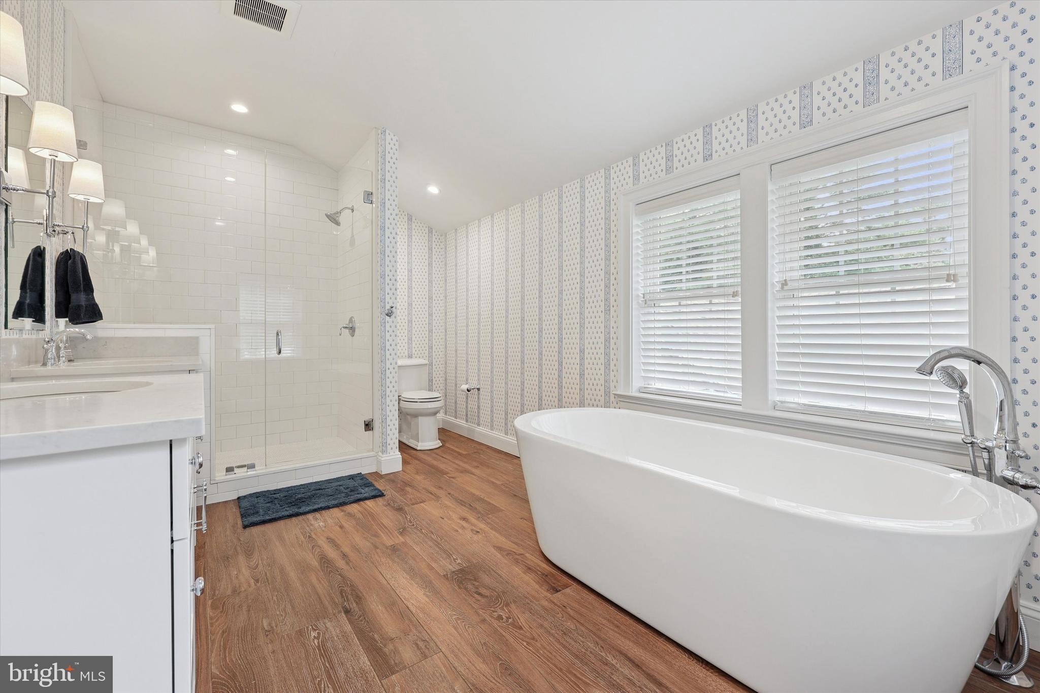 280 Deepdale Road Wayne, PA 19087 - Photo 26 of 35 a white bath tub sitting in a en suite bathroom