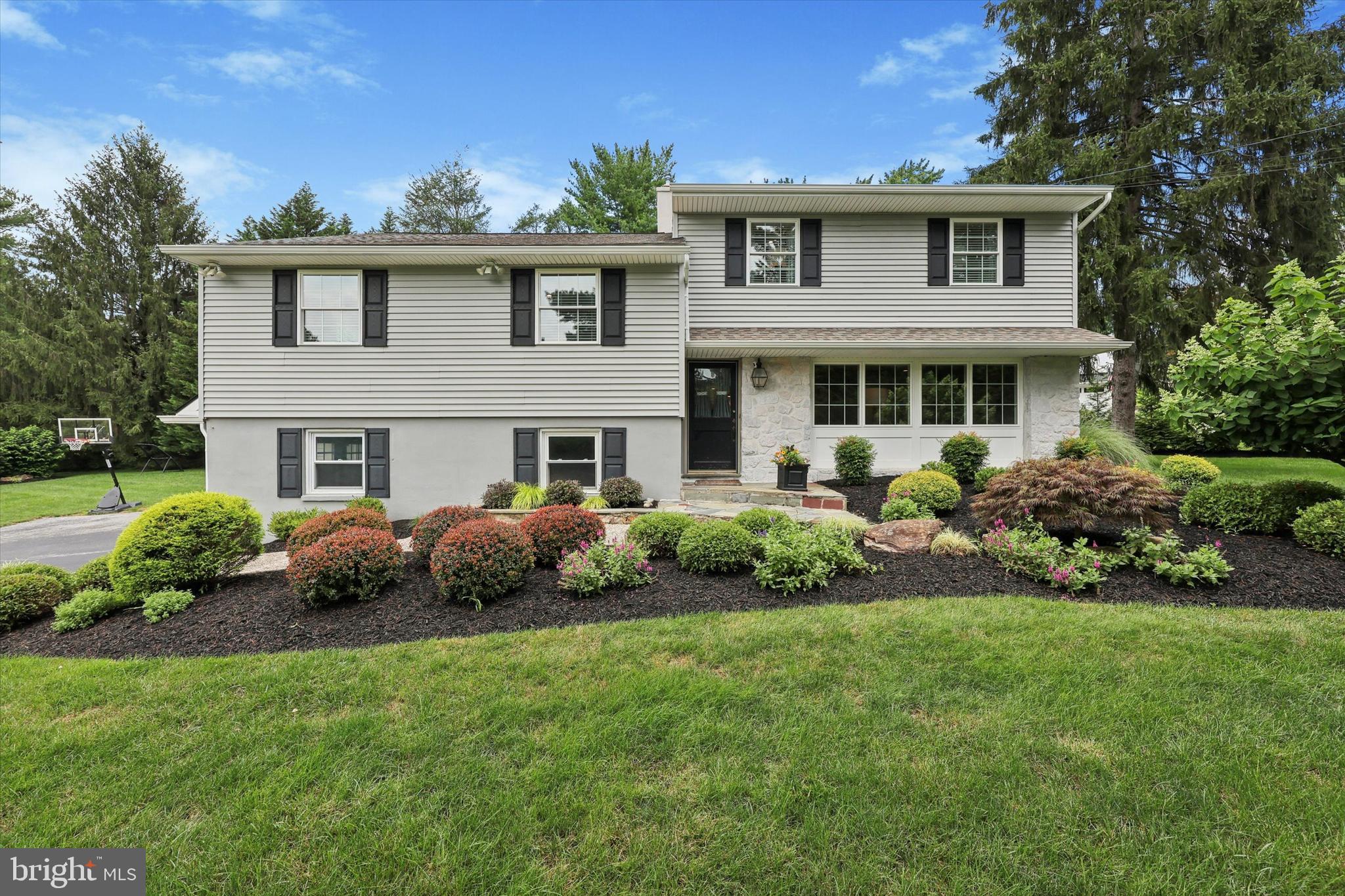 280 Deepdale Road Wayne, PA 19087 - Photo 33 of 35 a front view of a house with a garden