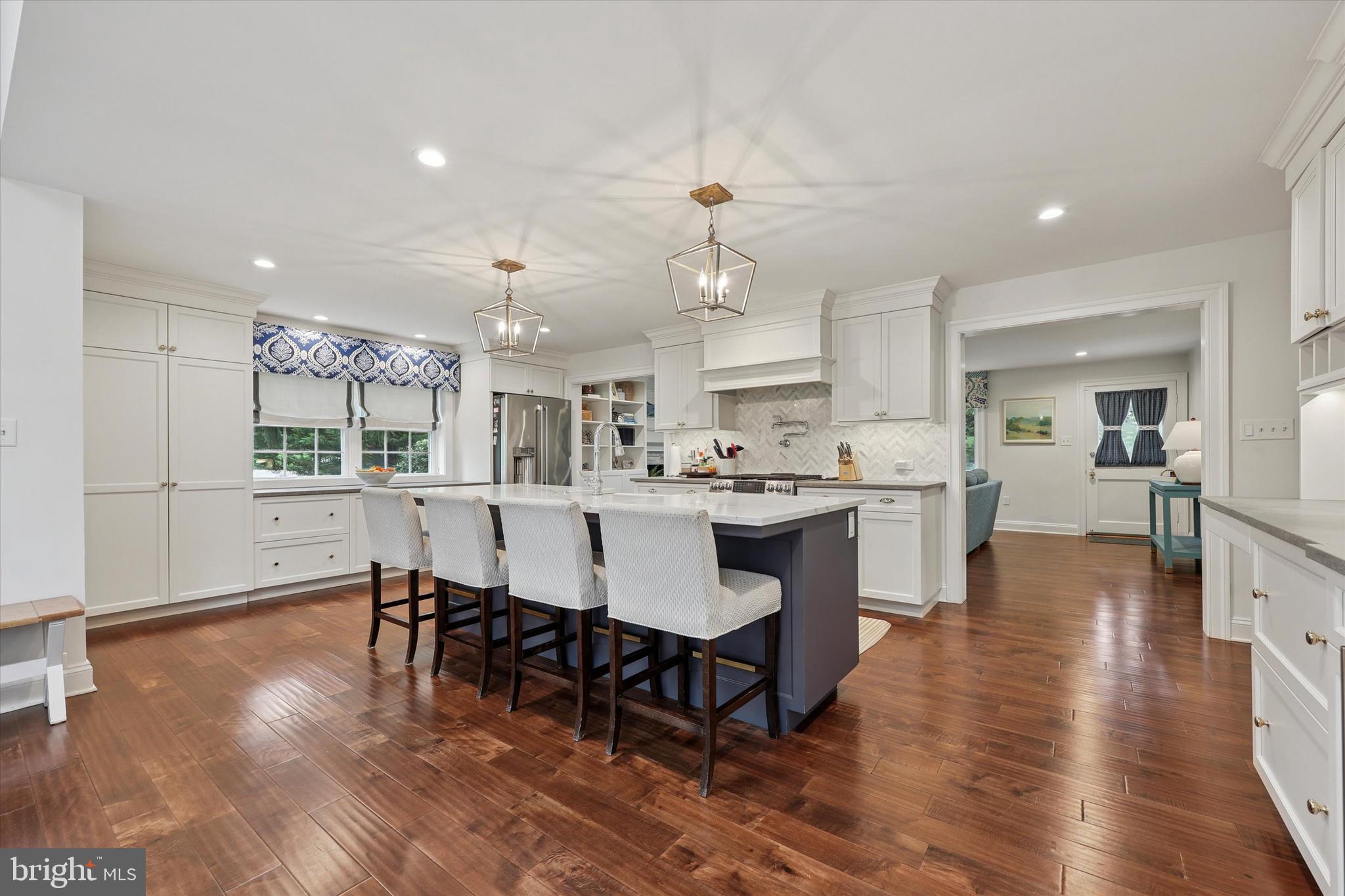 280 Deepdale Road Wayne, PA 19087 - Photo 9 of 35 a large kitchen with a table and chairs
