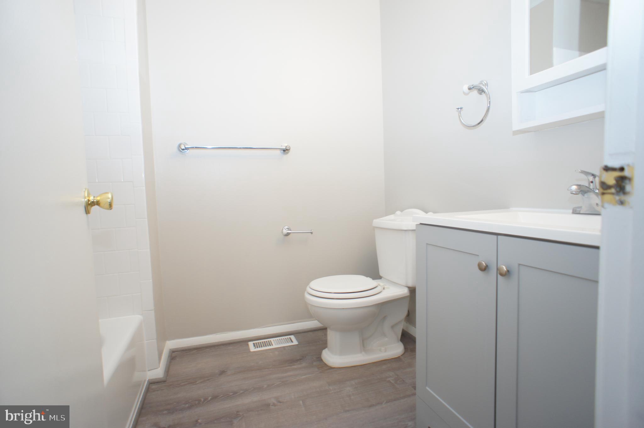 6 Coliston Road, Unit C Reisterstown, MD 21136 - Photo 13 of 18 Updated Bath New Vanity Floor