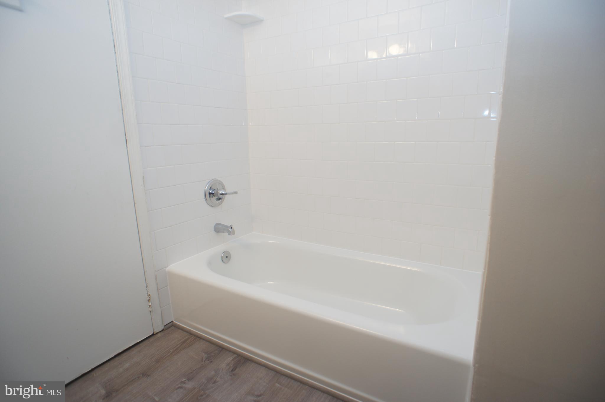 6 Coliston Road, Unit C Reisterstown, MD 21136 - Photo 14 of 18 Bright New Tile and Sealing