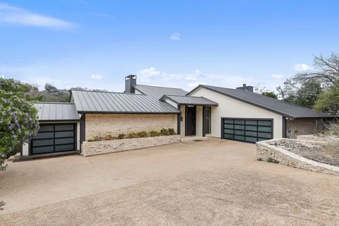 a view of a house with a garage