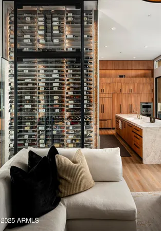 a living room with a couch and a stove top oven