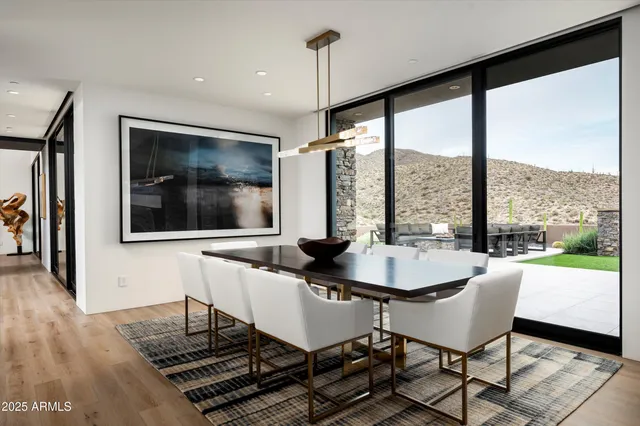 a view of a livingroom with furniture and a window