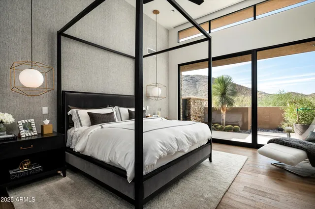 a bathroom with a granite countertop sink and a toilet